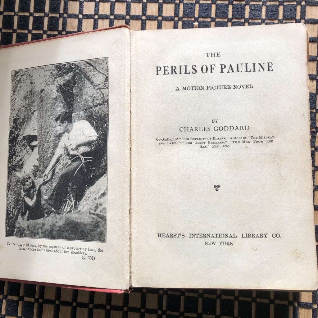 Perils of Pauline title page (1914) with black and white illustration.