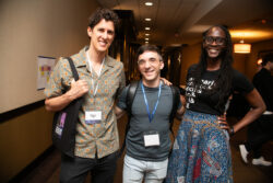 Executive director Isis Asare, volunteer Michael Solis, and volunteer Phoenix Alexander stop long enough for a photo.